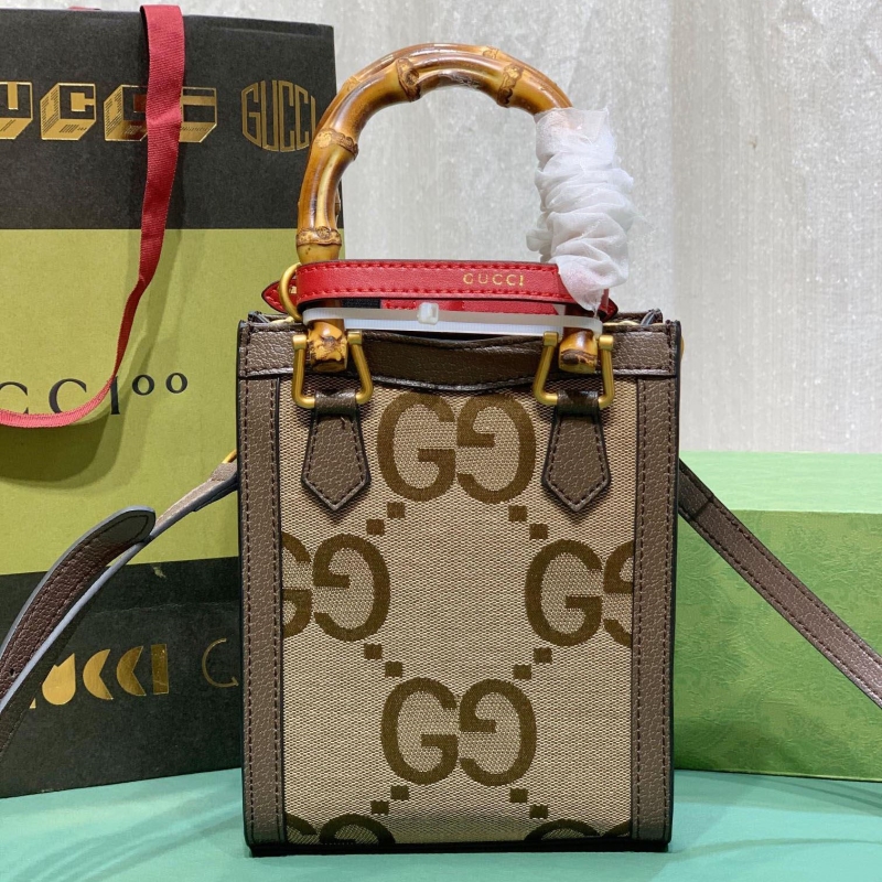 G*u*i top handle bags